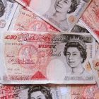 A pile of 50 pound notes