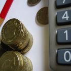 Free image of a Calculator and coins